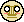 A blushing light yellow with a darker yellow harp and white eyes.